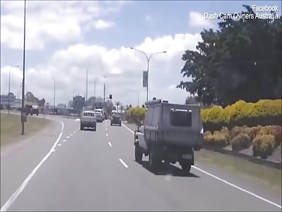 Terrifying moment speeding truck driver loses control and crashes