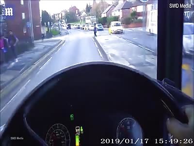 Terrifying moment a schoolgirl is almost hit by double decker bus