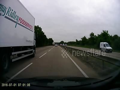 Car seemingly loses control and crashes into lorry on motorway