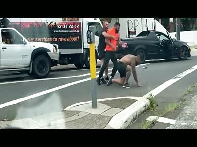 Moment driver & shirtless motorist brawl in the middle of Sydney road