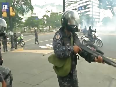 Venezuelan police fire tear gas on anti-Maduro protesters