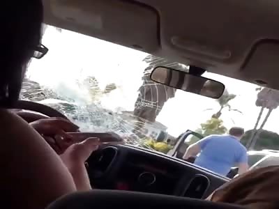 Dude Jumps On Womanâ€™s Windshield & Smashes It With His Fist 