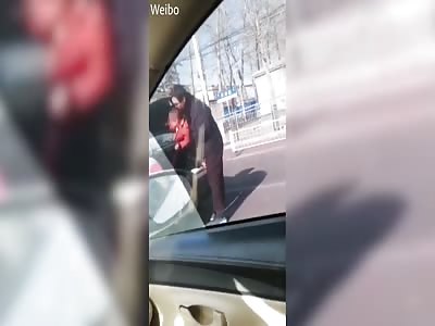 *Father* tosses 'naughty' son into the boot of his car