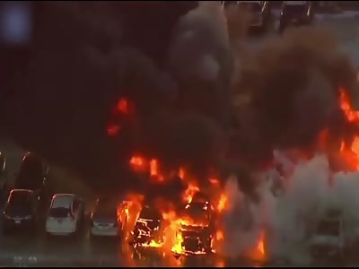 Cars engulfed in flames in parking lot at Newark Airport