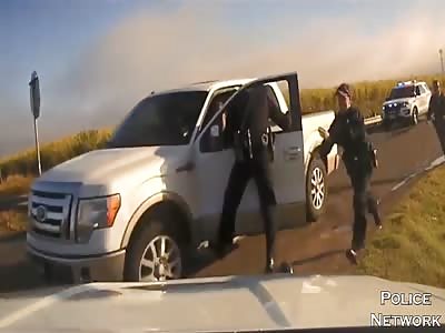 Driver Flees With Texas Officers Hanging From Pickup Truck