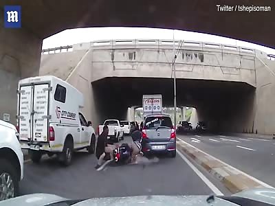 Biker hits pedestrian in peak traffic in South Africa
