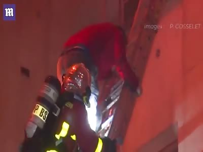 Firefighters rush to get residents out of Paris apartment block