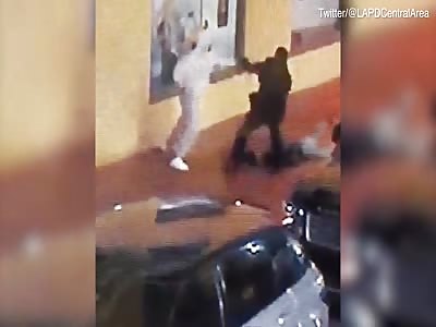 Woman that gets dragged along sidewalk by robber is saved by valet