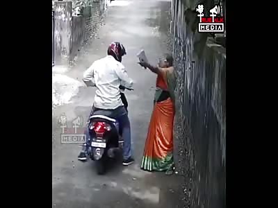 Scooter guy robs older woman