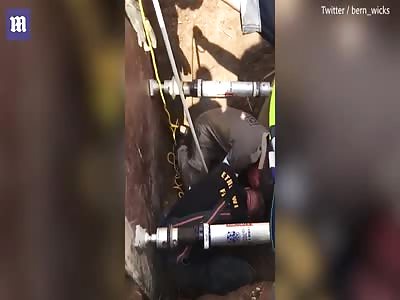 Newborn baby is pulled alive from a storm drain