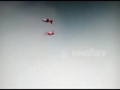 Two jets collide mid-air during practice sortie for air show