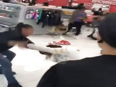 Girl Pulls A Gun During Huge Fight Inside A Burlington Coat Factory