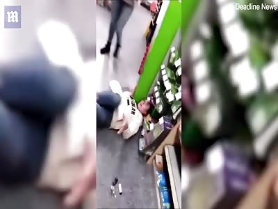 Moment stabbing victim escapes store with blood pouring down her face