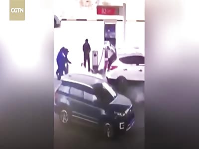 Female petrol station workers react quickly to the fire