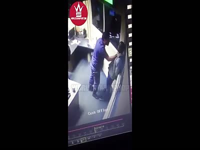 South African Police Officer Repeatedly Smacks Handcuffed Suspect!