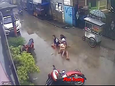 Girls crash on a motorcycle