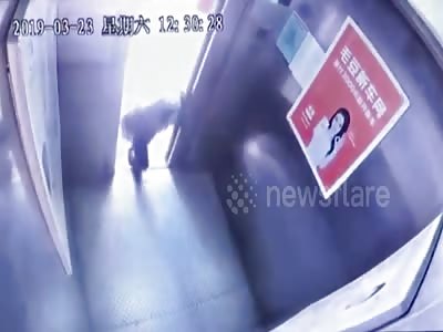 Old Chinese woman narrowly escapes death climbing out of elevator