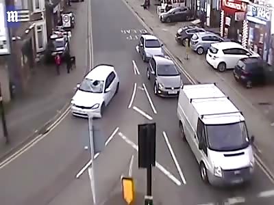 Horrifying moment teen somersaults after being struck by car
