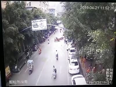 Goose drops out of the sky onto woman riding scooter