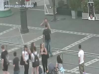 An aggressive drunk man and a Czech city cop in a civile