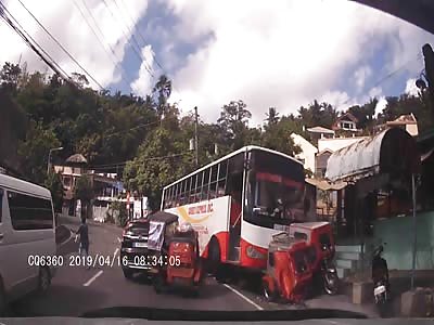 Runaway Bus Slams Parked Tricycles