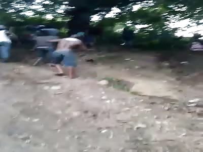 Guy looses control of motorbike and lunges over cliff
