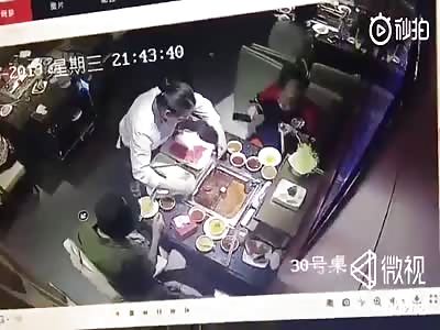 waitress tries to fish out a lighter from a hotpot....BOOM!
