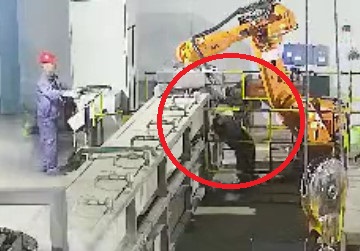 Worker is Crushed by Robot Arm