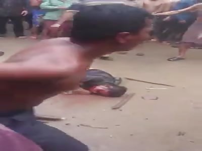 Cambodia. man murdered his wife and step daugher and gets lynched and beaten