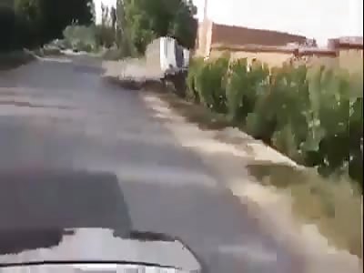 Idiots Hanging Out of Car Wreck into Ditch