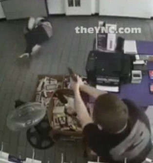 Phone Store Employee Unloads on Would Be Robber