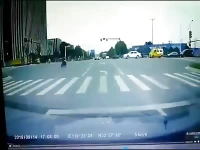 Biker Turned Gymnast at Intersection