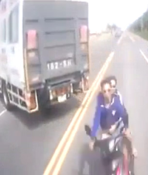 Biker w/ Passenger Hits Truck Head On