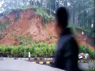 Landslide Damn Near Swallows Biker
