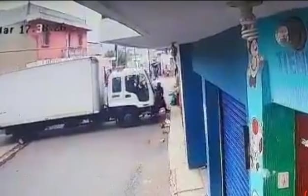 Truck Crushes Woman Against Wall
