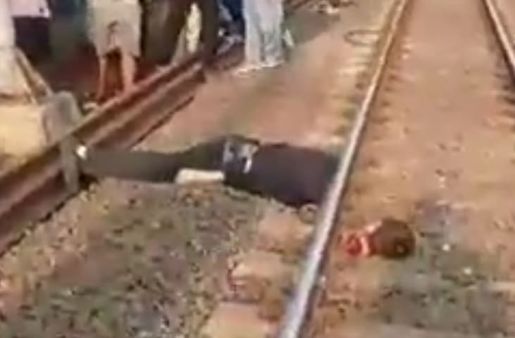 Beheaded in Train Suicide