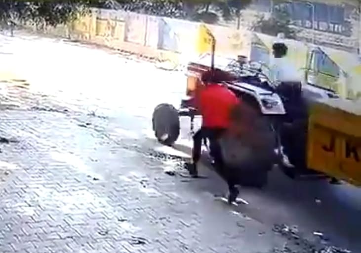 Man Fails Miserably Attempting to Catch Ride on Tractor