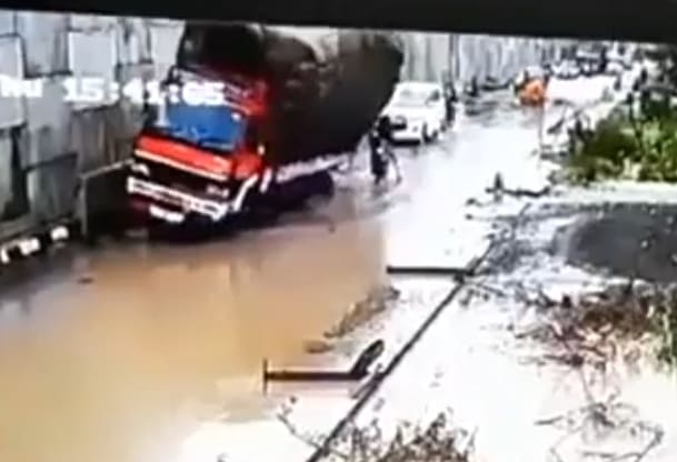Poor Bastard Crushed by Truck