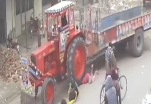 Girl Crushed Under Wheels of a Tractor
