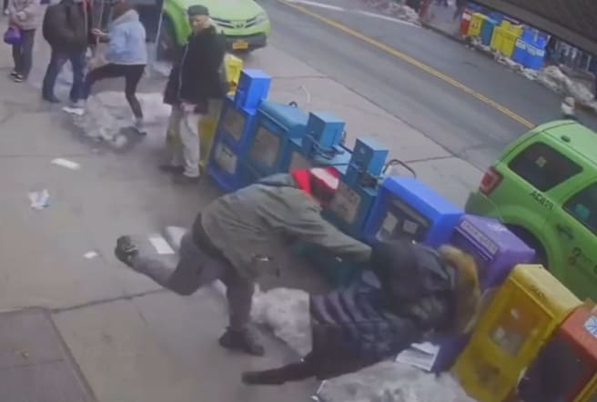 Asian Woman Pushed in Unprovoked Attack 