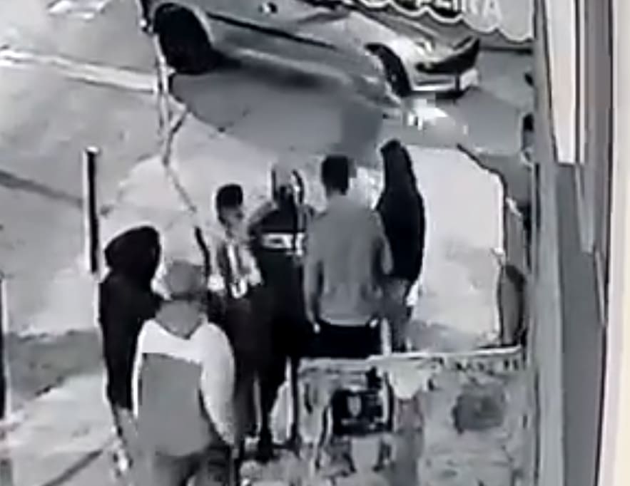 Crowd Watches Murder Outside of Bar
