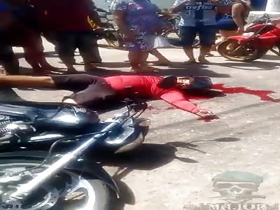 Redshirt shot dead off his motorcycle.