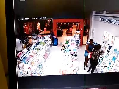 women stealing in a store