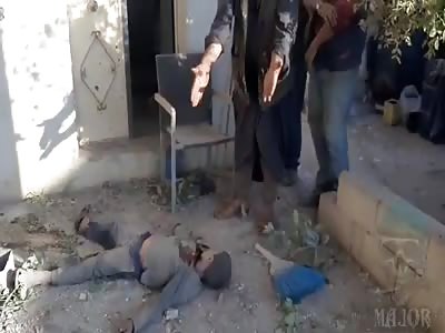 father cries for dead son in Syria