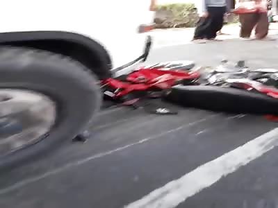 smashed under truck 