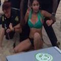 Bikini Chick Goes Ham at a Beach Party Beating a Female Officer Before Getting Well You Know.....