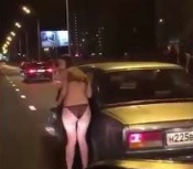 Russian Women Strip To Their Underwear And Beg By The Road to Police 