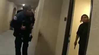 Moron Answers Door with a Gun When Police Knock.