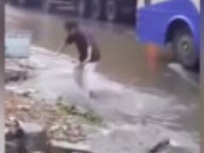 Drunk Dude Sucked into Manhole...Vanishes