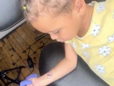 Outrage on Social Media after Mother Gets Daughter Tattoo'd